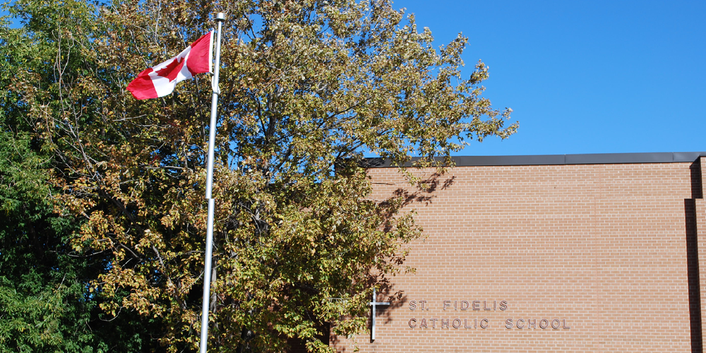 Banner showing the front of the St. Fidelis school building