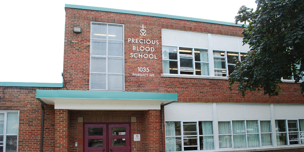 Banner - photo of Precious Blood school building