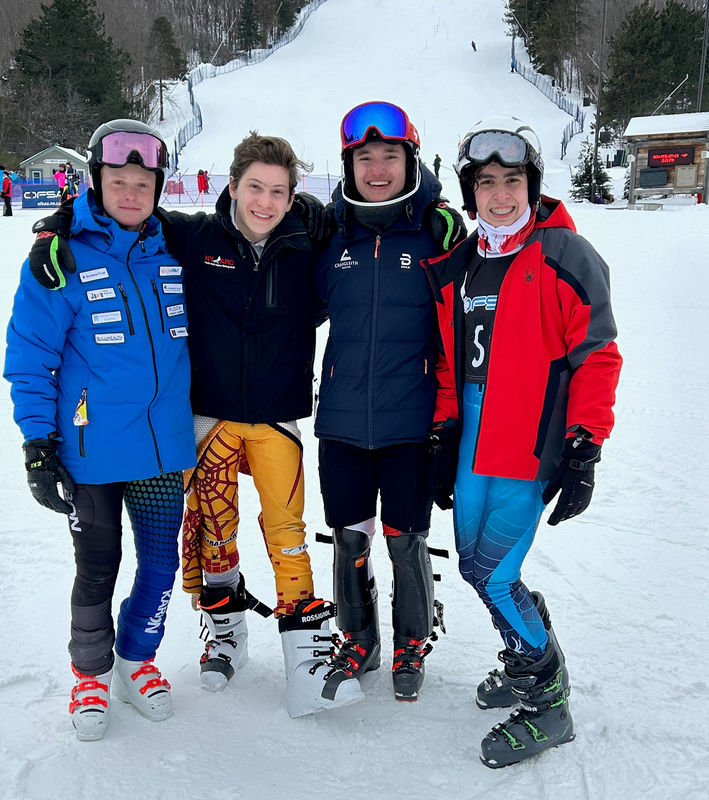 FJR Ski Team posing on the slopes for a photo