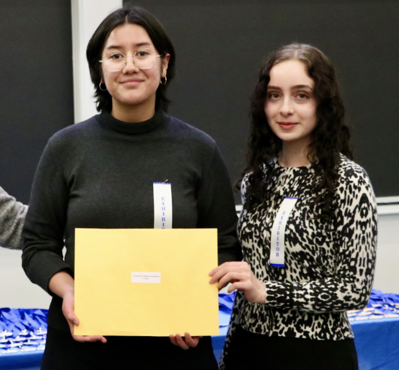 Youmna A. and Samantha P. with their certificate and ribbons at the Canada Wide Science Fair.