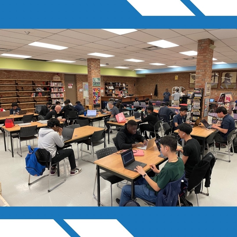 Photo of students in the Libermann library participating in the Skills Canada networking and coding competitions.