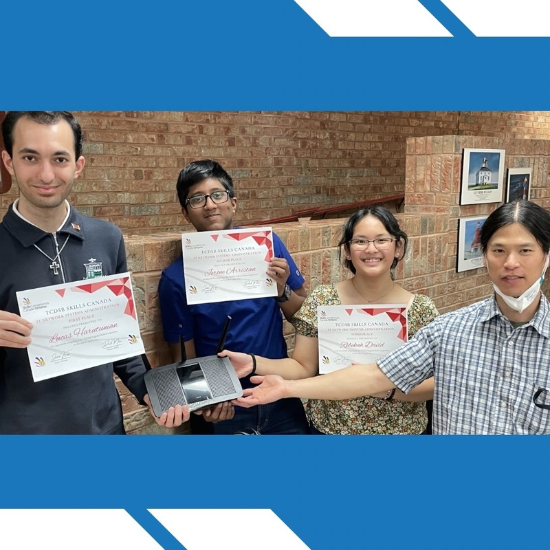 Group photo of students who participated in the Skills Canada networking competition holding up their winners' certificates.