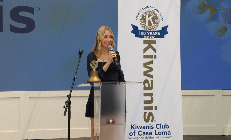 Photo of Claudia at the podium giving her speech