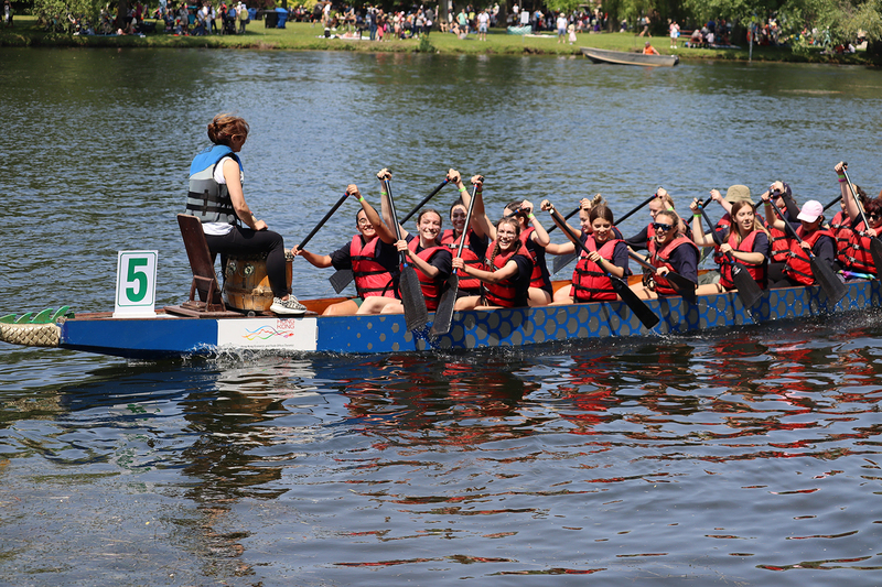 FJR dragonboat team paddling out on the water