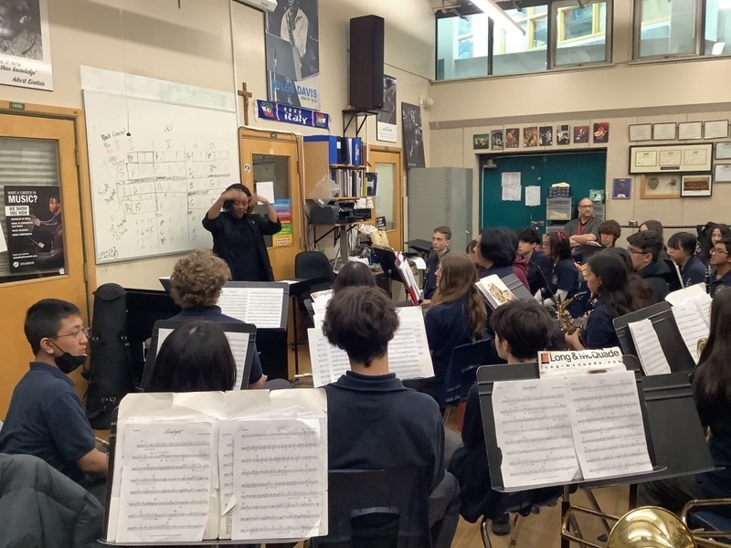 Dr Laytoya Webb in workshop with BA Varsity Band