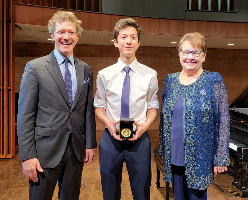Peter receiving his National Gold Medal at a recent ceremony which included Mr. Alexander Brose (RCM President and CEO Designate) and Ms. Elaine Rusk (Vice President of Academics and Publishing)